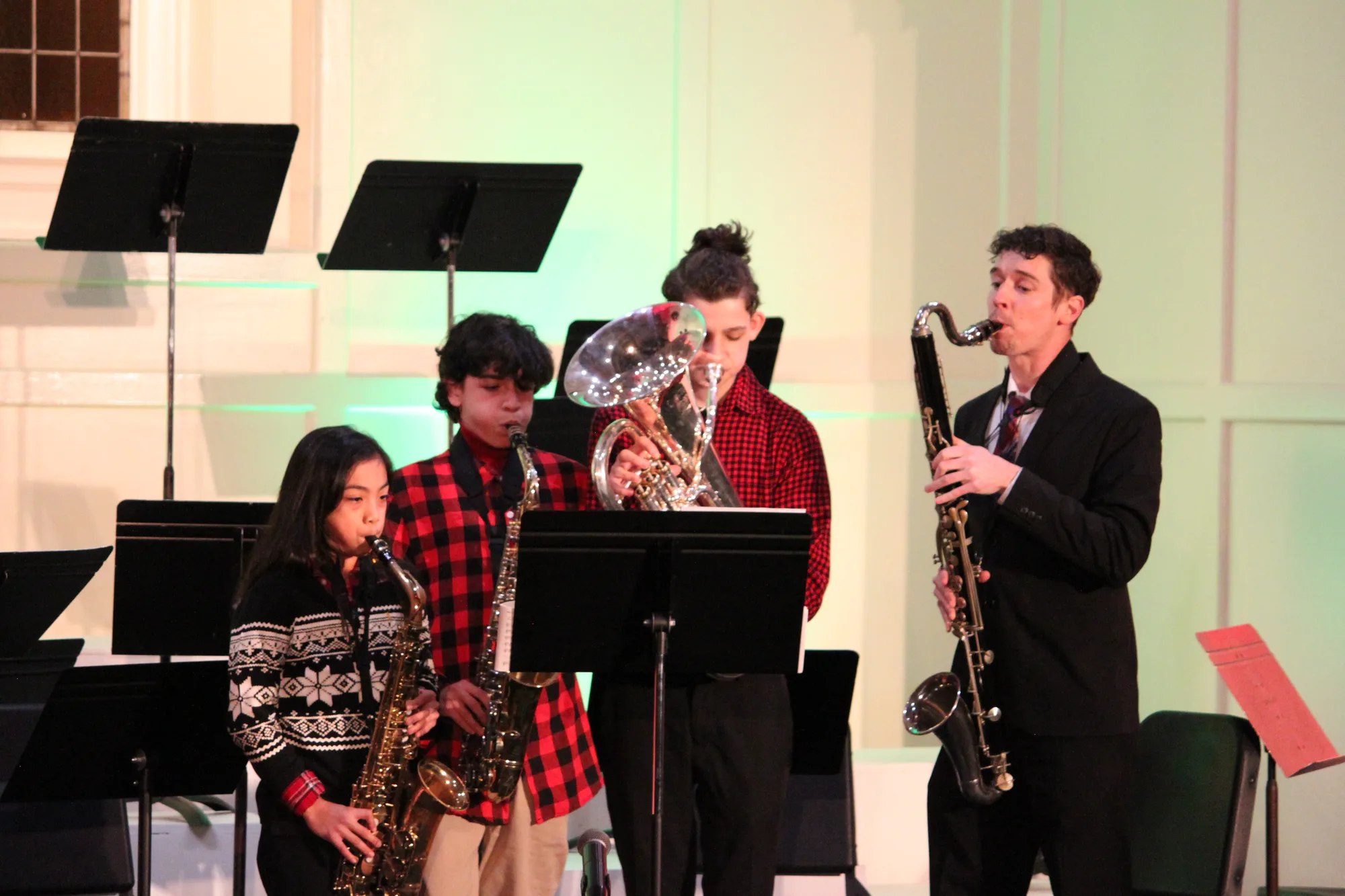 The student jazz ensemble performing, tightly framed